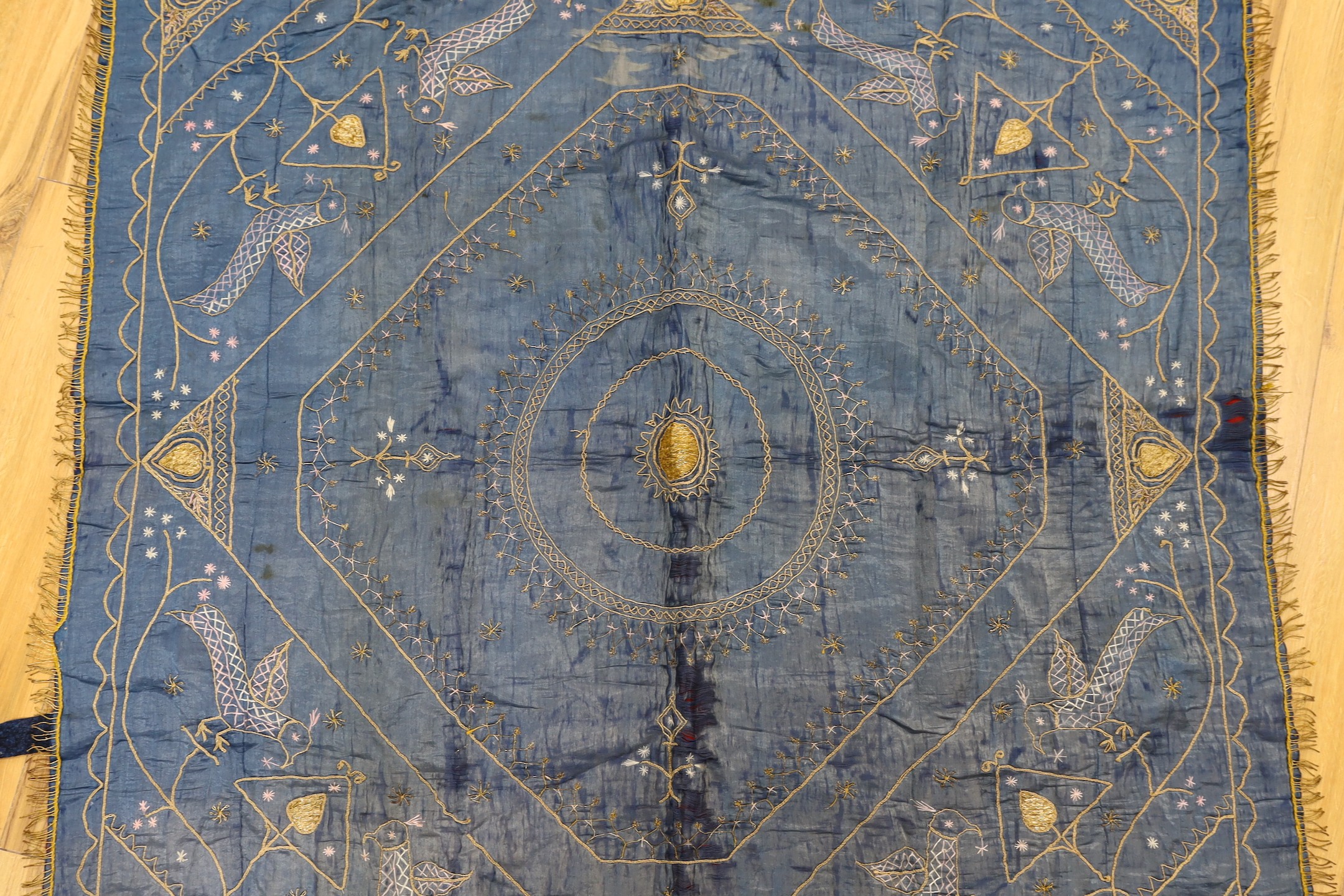 A late 19th century Indian silk and metal thread embroidered panel, approx: 118cms x118 cms